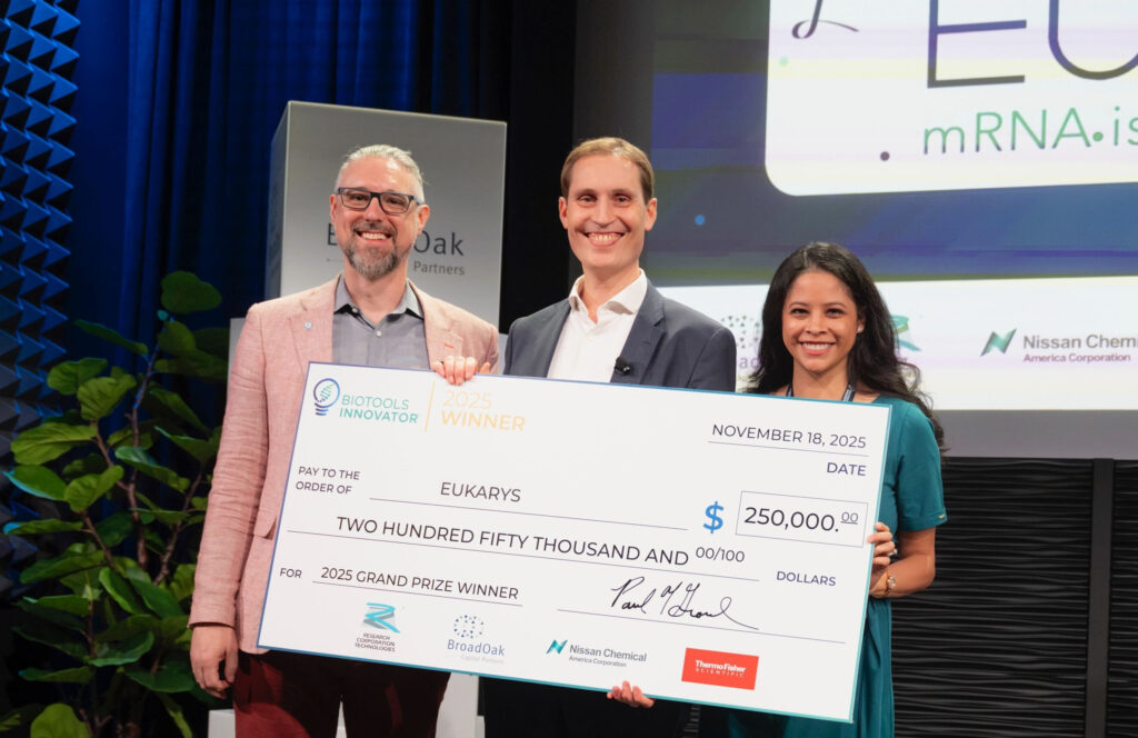 2025 BTI Grand Prize winner with check