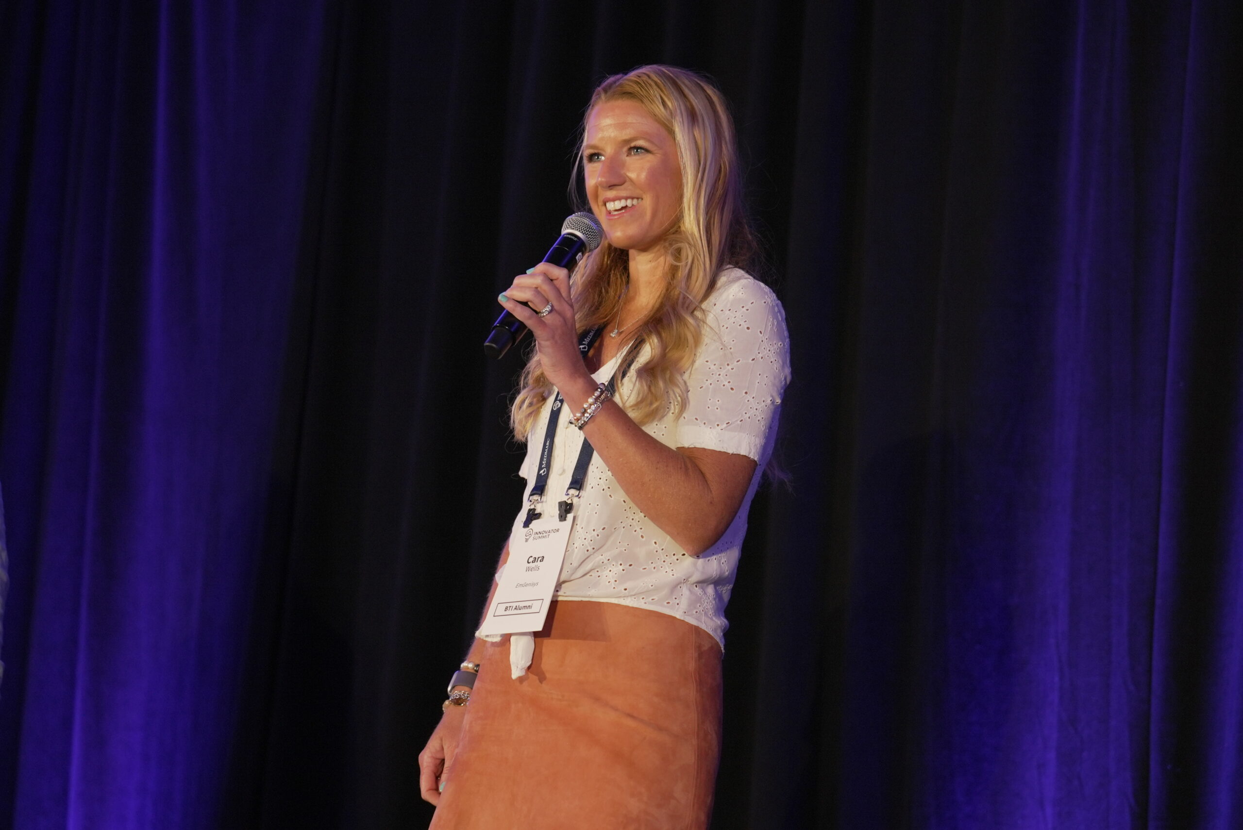 Cara Wells of EmGenisys speaking at a BioTools Innovator event